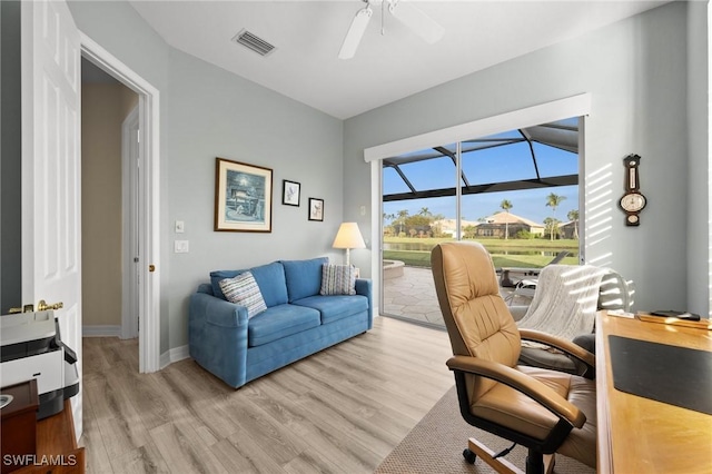 office area featuring ceiling fan and light hardwood / wood-style floors