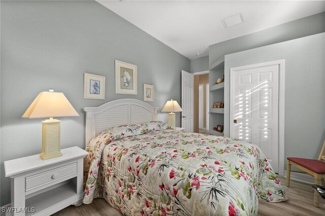 bedroom featuring light wood-type flooring