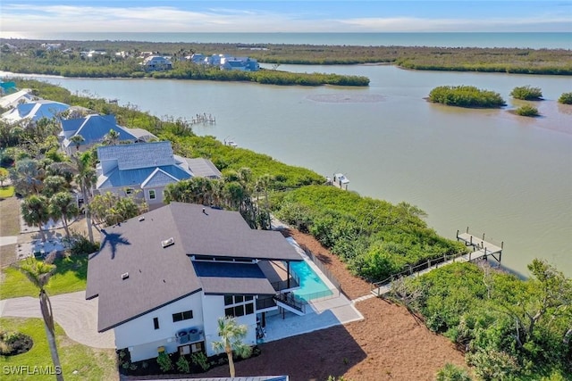 aerial view featuring a water view