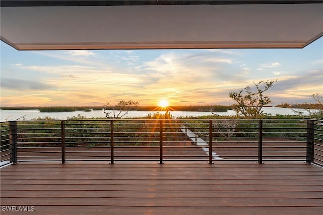 deck at dusk with a water view