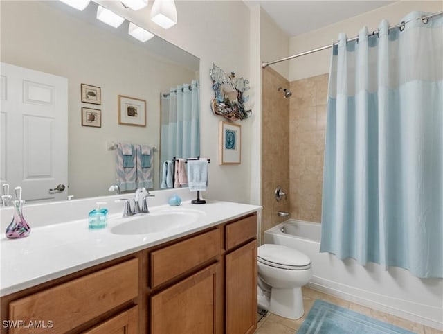 full bathroom featuring toilet, tile patterned floors, shower / bath combo, and vanity