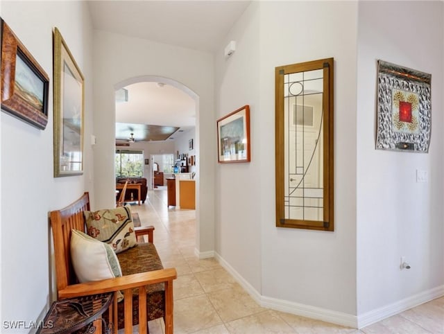 hall with light tile patterned flooring