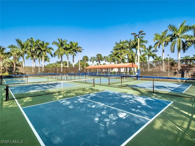 view of sport court with basketball hoop