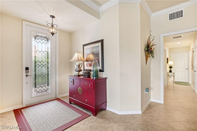 tiled entryway with crown molding