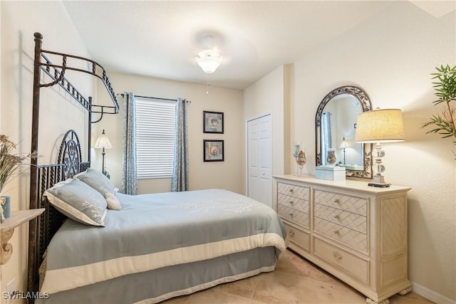 bedroom featuring light tile patterned flooring