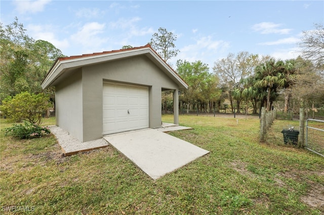 garage with a lawn