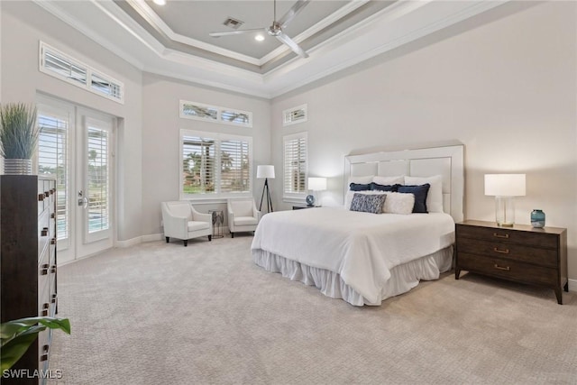 carpeted bedroom featuring a towering ceiling, french doors, access to exterior, ceiling fan, and crown molding