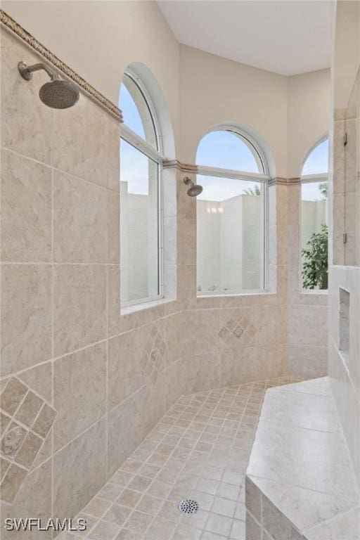 bathroom featuring a tile shower