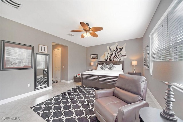 bedroom featuring ceiling fan and light tile patterned floors