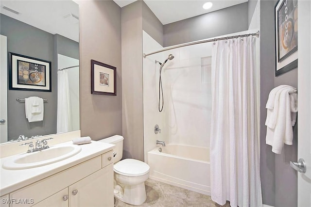 full bathroom featuring toilet, tile patterned floors, vanity, and shower / tub combo with curtain