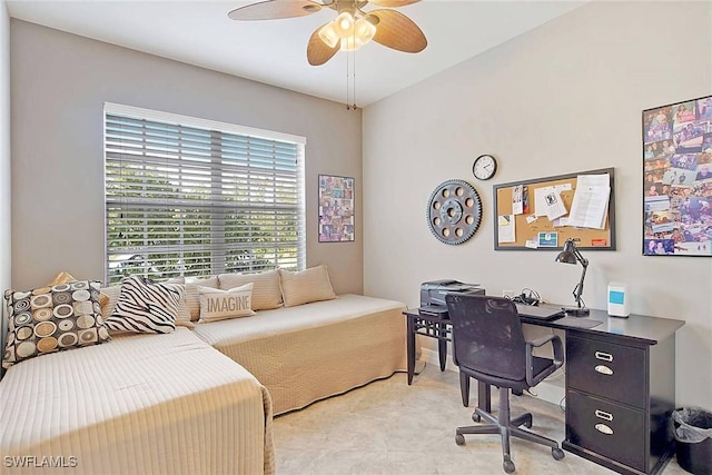 office featuring ceiling fan and light carpet