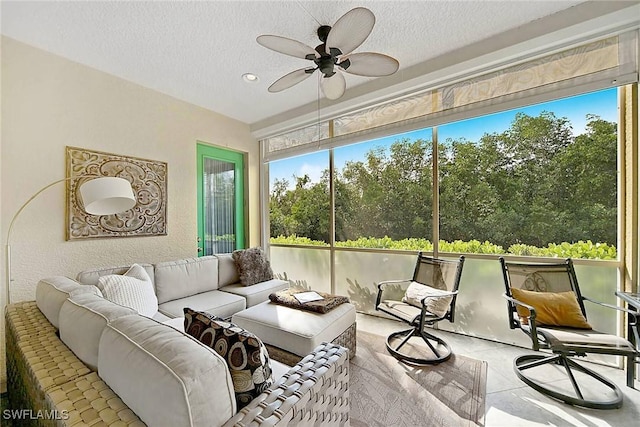 sunroom / solarium with ceiling fan