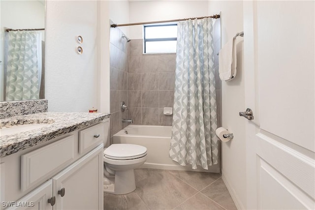 full bathroom with toilet, shower / bath combo, vanity, and tile patterned floors