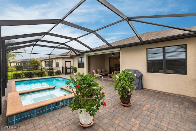 view of swimming pool featuring a lanai, grilling area, a patio area, an outdoor hangout area, and an in ground hot tub