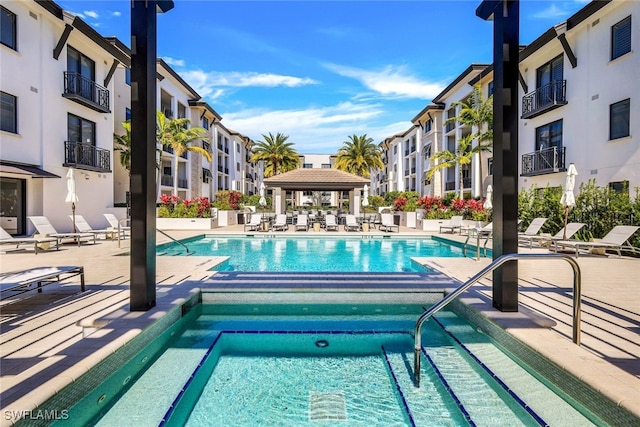 view of pool featuring a gazebo and a patio area