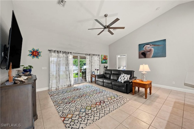 living room with light tile patterned flooring, high vaulted ceiling, and ceiling fan