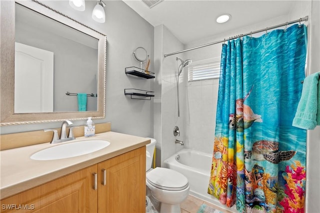 full bathroom with shower / tub combo with curtain, toilet, tile patterned flooring, and vanity