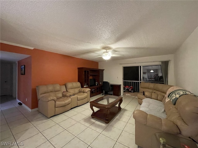 tiled living room featuring ceiling fan and a textured ceiling