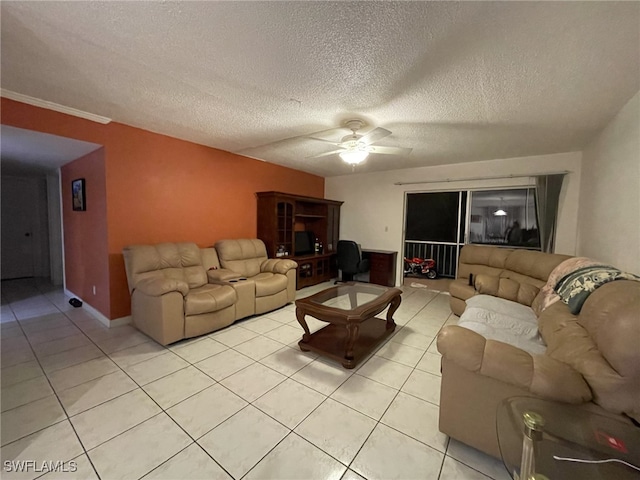 tiled living room featuring a textured ceiling, ceiling fan, and crown molding