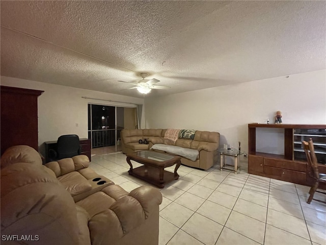 tiled living room with a textured ceiling and ceiling fan