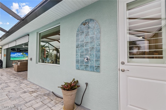 property entrance with a patio