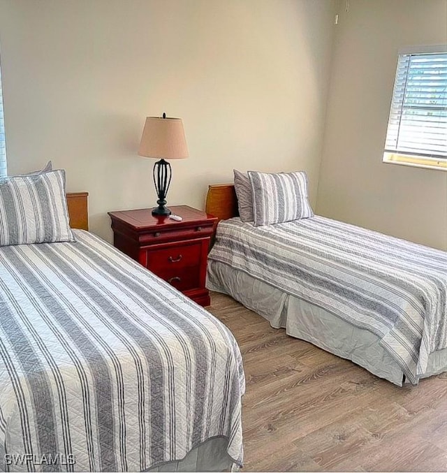 bedroom featuring light hardwood / wood-style floors