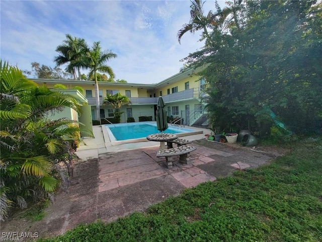 view of pool with a patio