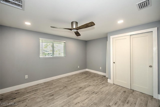 unfurnished bedroom featuring a closet, ceiling fan, and light hardwood / wood-style floors