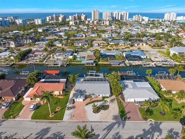 drone / aerial view with a water view