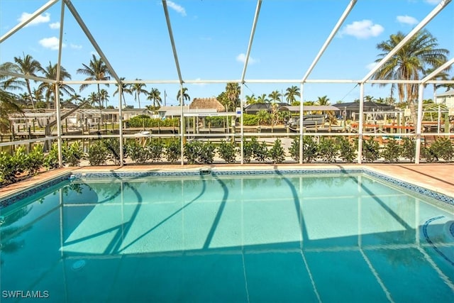 view of pool featuring a lanai