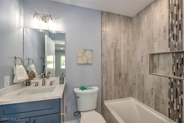 full bathroom with toilet, washtub / shower combination, and vanity