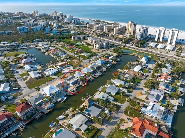 drone / aerial view featuring a water view