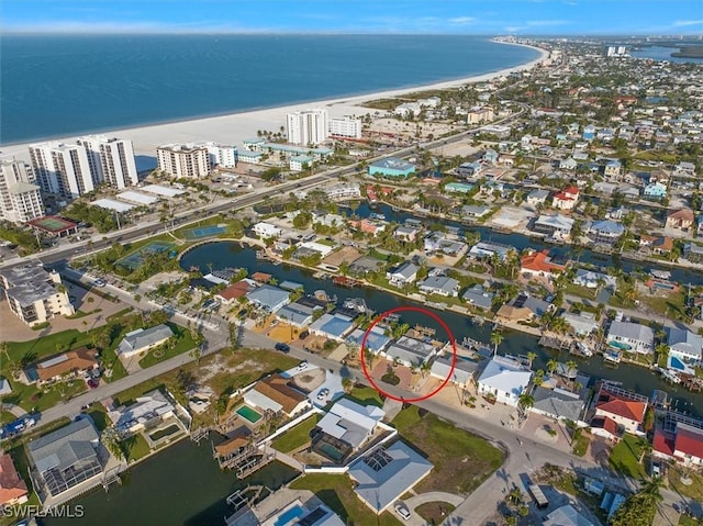 bird's eye view with a view of the beach and a water view