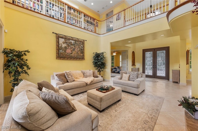 living area with tile patterned flooring, recessed lighting, baseboards, french doors, and crown molding