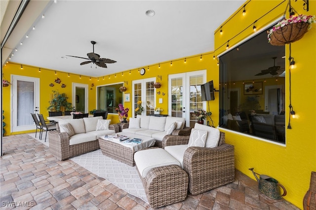 view of patio / terrace with a ceiling fan, french doors, and outdoor lounge area