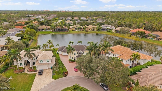 bird's eye view featuring a residential view and a water view