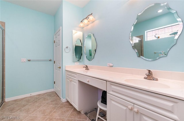 bathroom featuring walk in shower, tile patterned flooring, and vanity