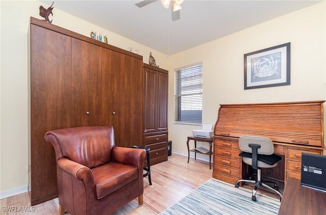 office with ceiling fan and light wood-type flooring