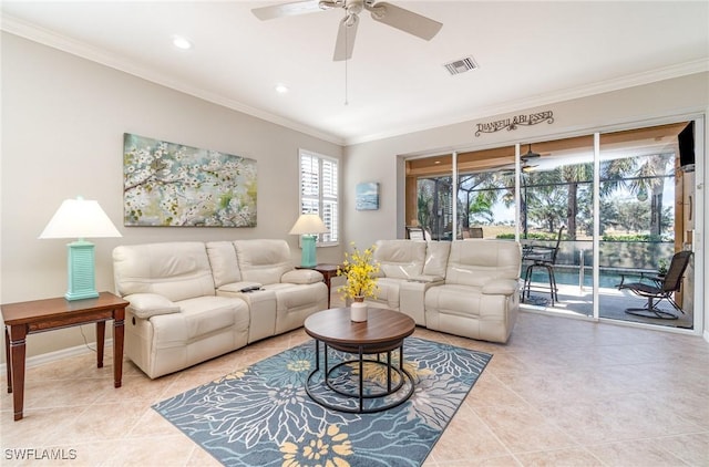 tiled living room featuring ceiling fan and ornamental molding