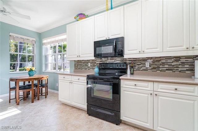 kitchen featuring light tile patterned floors, black appliances, backsplash, white cabinetry, and ornamental molding