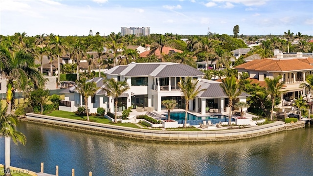 birds eye view of property featuring a water view