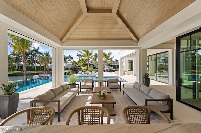 view of patio featuring a water view and an outdoor hangout area