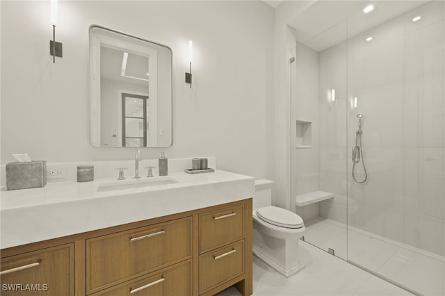 bathroom featuring tile patterned flooring, vanity, an enclosed shower, and toilet