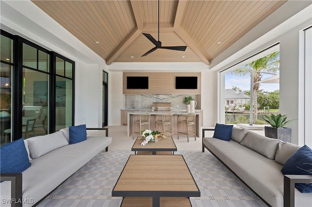 view of patio / terrace with outdoor lounge area, a grill, and ceiling fan