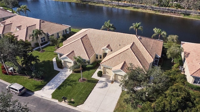 drone / aerial view featuring a water view