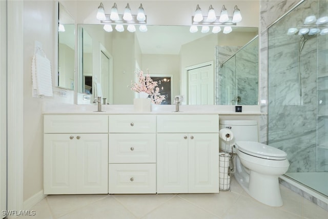 bathroom with toilet, a shower with door, tile patterned flooring, and vanity