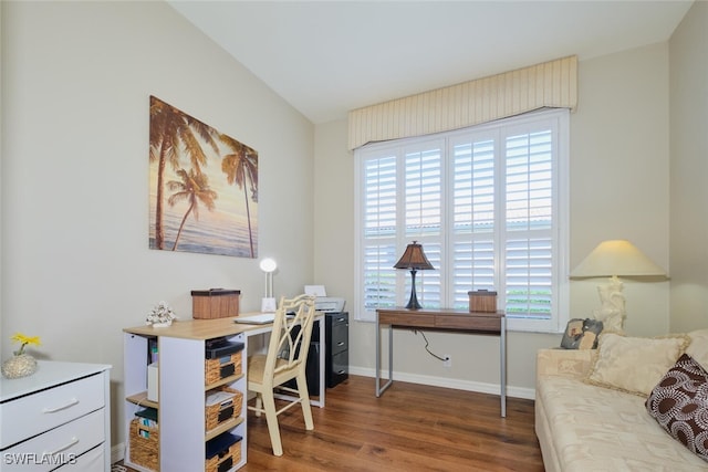 office with dark hardwood / wood-style flooring