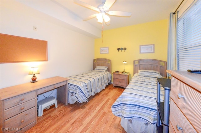 bedroom with ceiling fan and light hardwood / wood-style flooring