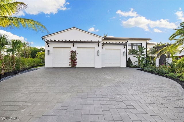 exterior space with decorative driveway
