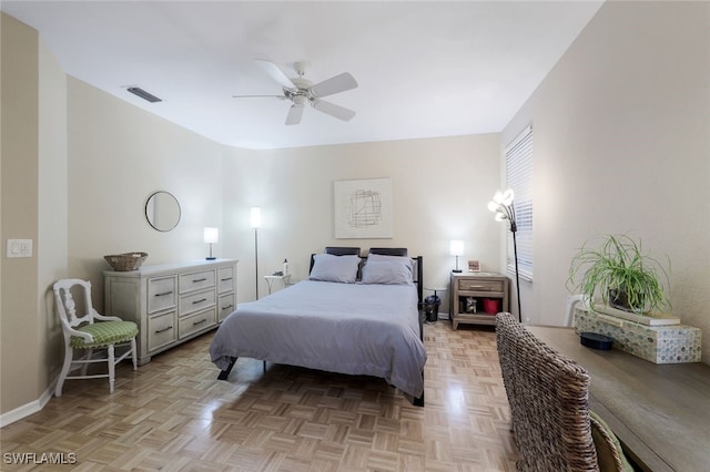 bedroom featuring ceiling fan and light parquet floors